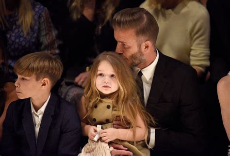 david beckham burberry coat|Harper Beckham, Victoria Beckham, David Beckham at Burberry .